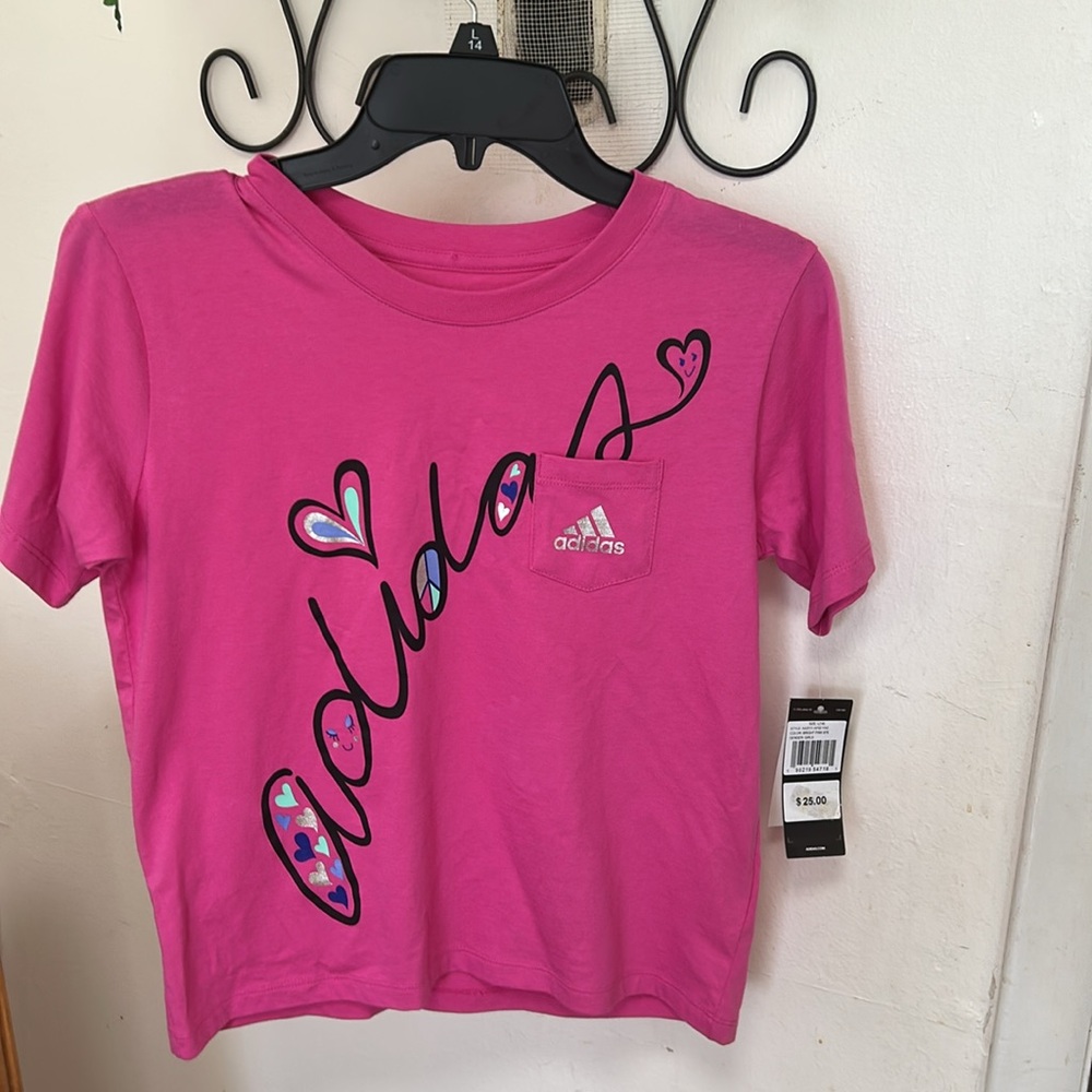 NWT Adidas Girl’s Pink Tee Shirt with a Calligraphy Graphic Logo Design